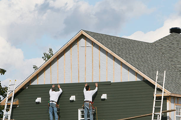 Professional Storm Damage Siding Repair technician working in Newport, SC